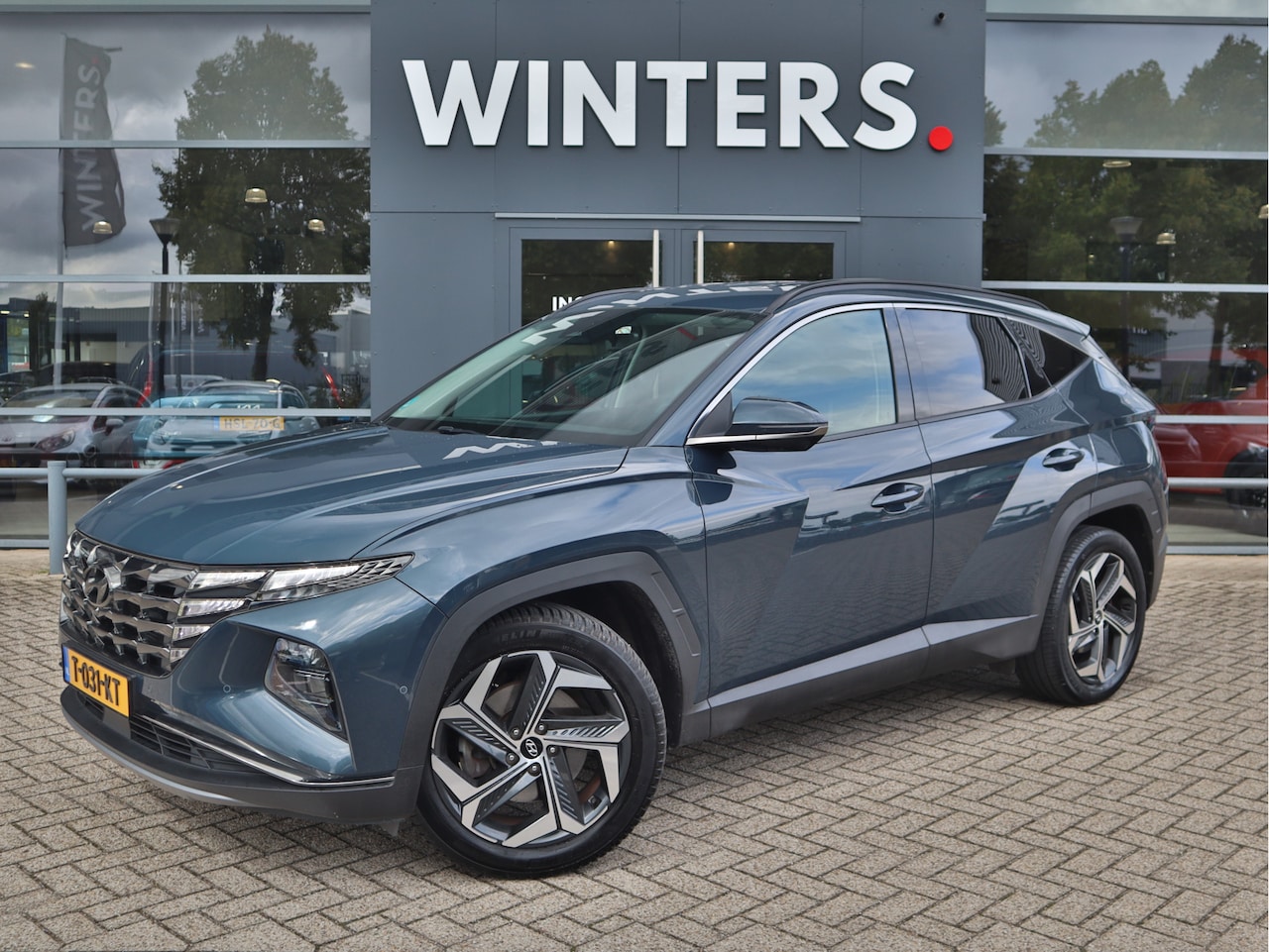 Hyundai Tucson - 1.6 T-GDI HEV Premium | Navigatie | Camera | Stoelverwarming/Ventilatie | All-Seasons | Af - AutoWereld.nl