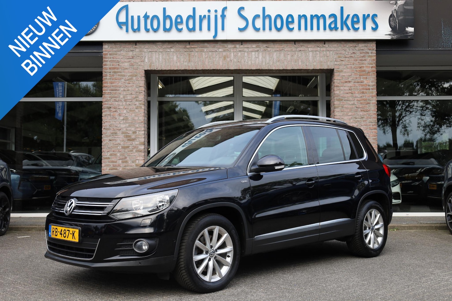 Volkswagen Tiguan - 1.4 TSI Lounge Edition STOELVERW. CAMERA CRUISE BT-TELEFOONVERB. NAVI CLIMA KEYLESS 2XPDC - AutoWereld.nl