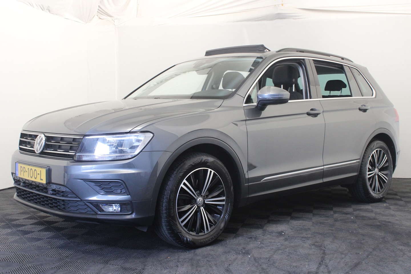 Volkswagen Tiguan - 1.4 TSI ACT Comfortline |Pano|Stoelverw.|Navi| - AutoWereld.nl