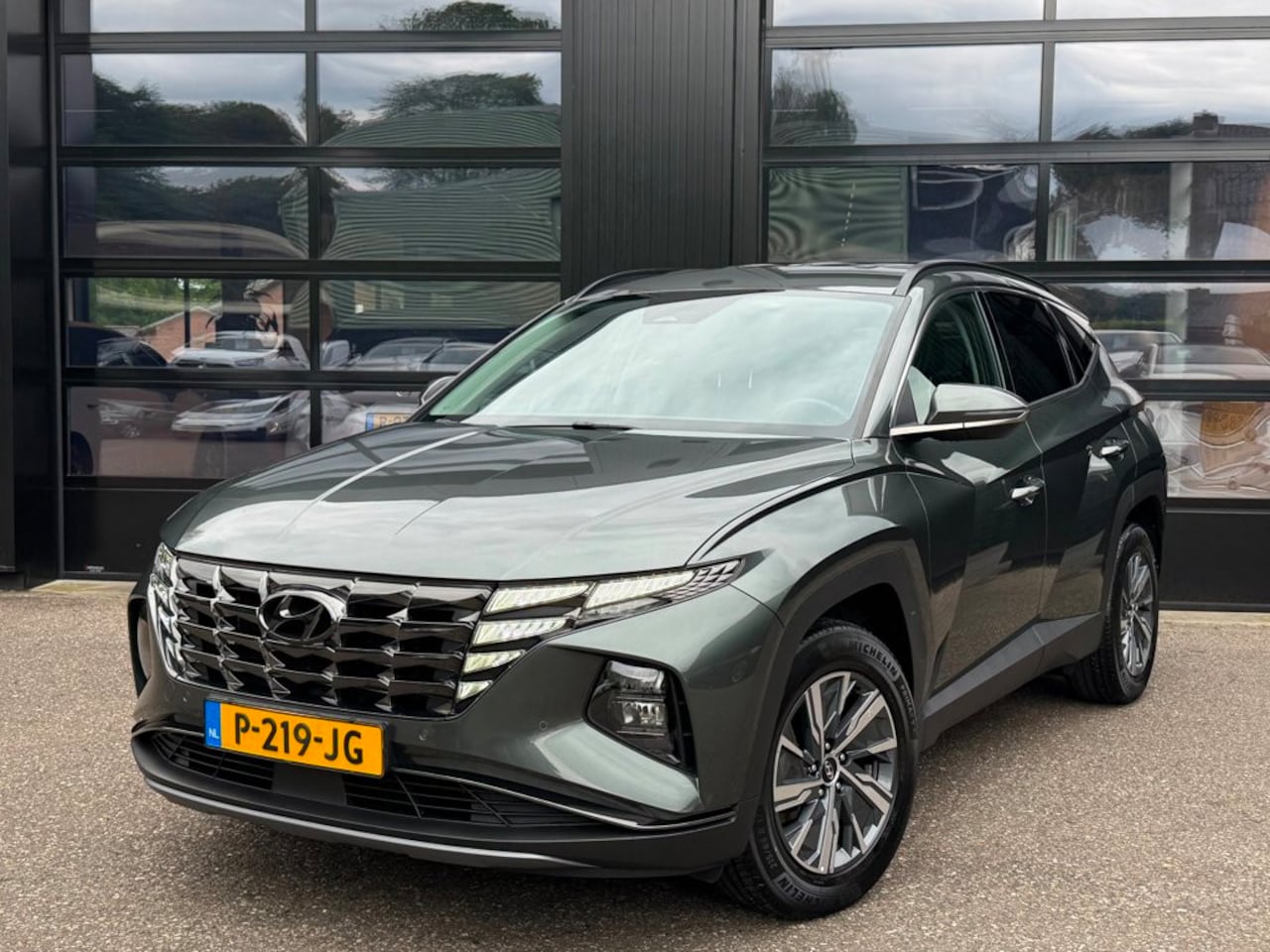Hyundai Tucson - 1.6 T-GDI HEV Comfort Leer Trekhaak 1e eig. - AutoWereld.nl