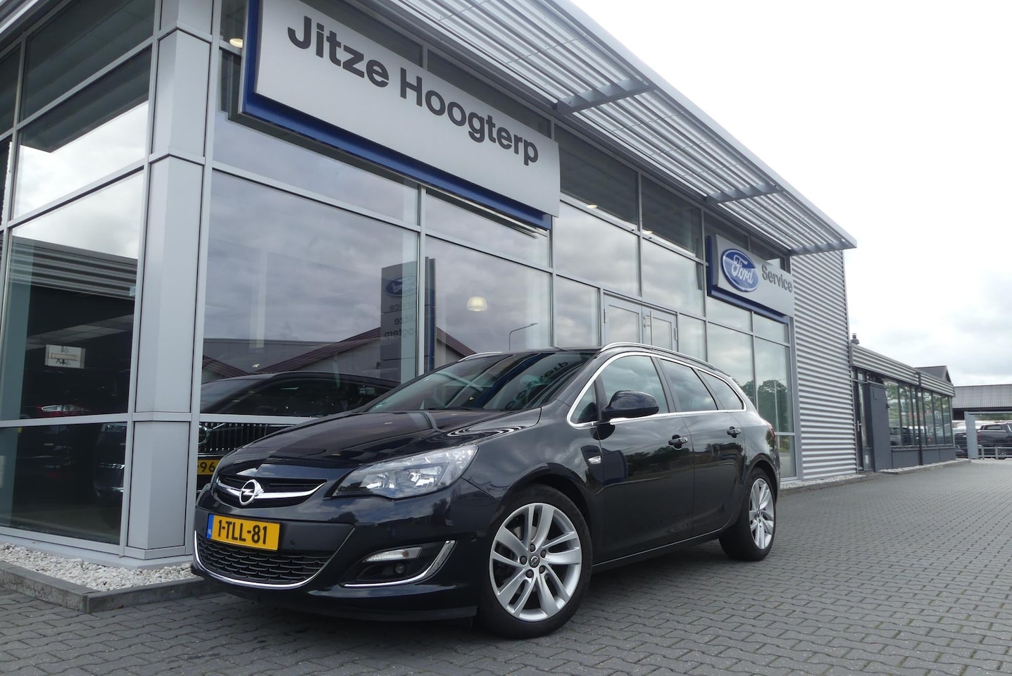 Opel Astra Sports Tourer - 1.6 Turbo Cosmo TREKHAAK, LEER, WINTER PACK, CRUISE, CLIMA, NAVI, CAMERA, PDC V&A, BLIS, D - AutoWereld.nl
