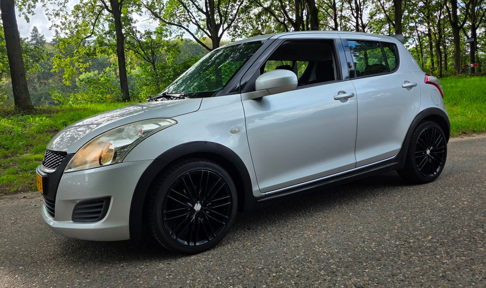 Suzuki Swift - 1.2 - GELUID IN BAK - NL Auto - 5 Deurs - Airco - AutoWereld.nl