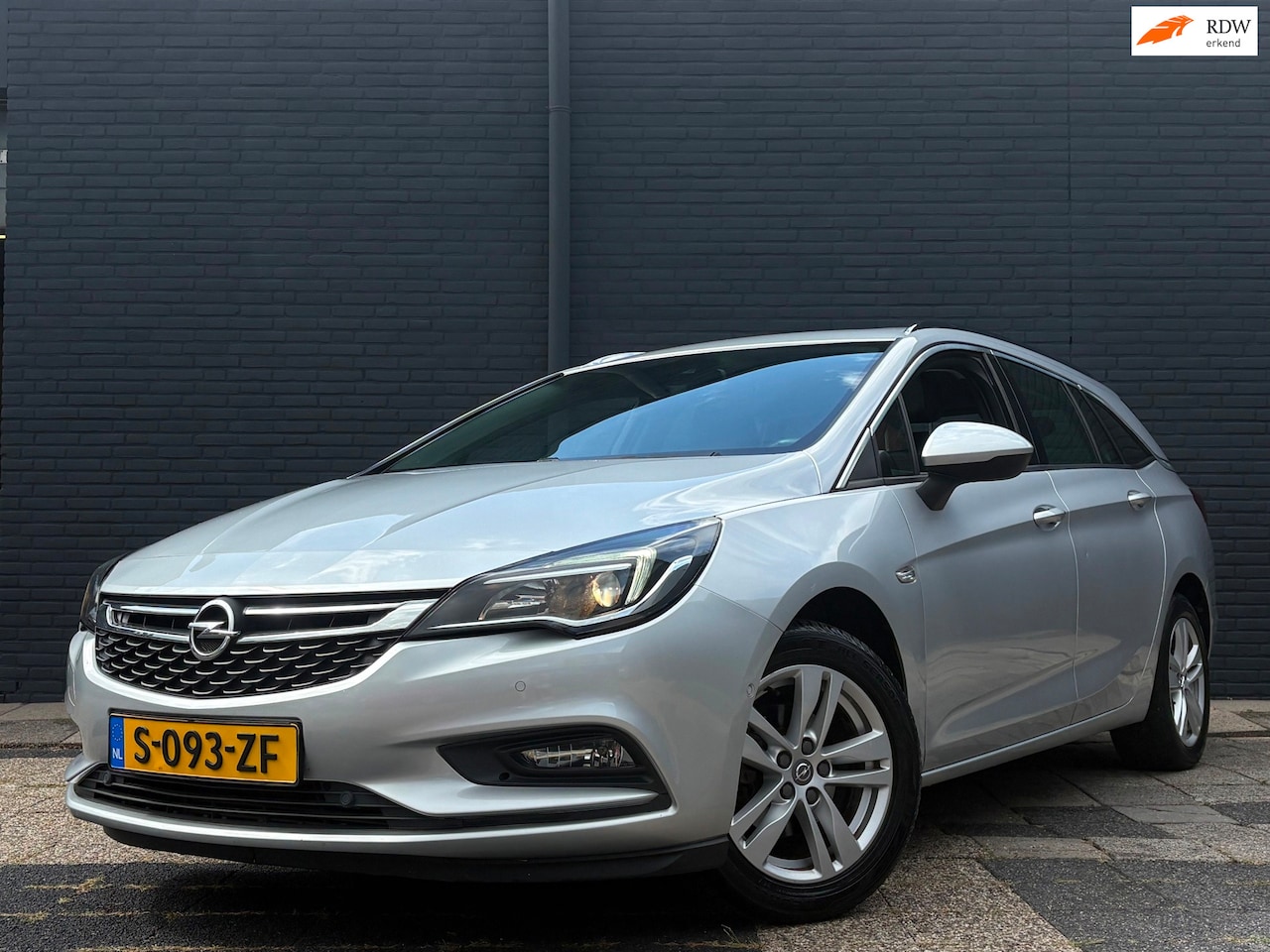 Opel Astra Sports Tourer - 1.0 Business Executive | Schuifdak | Stoel/Stuur Verwarming - AutoWereld.nl