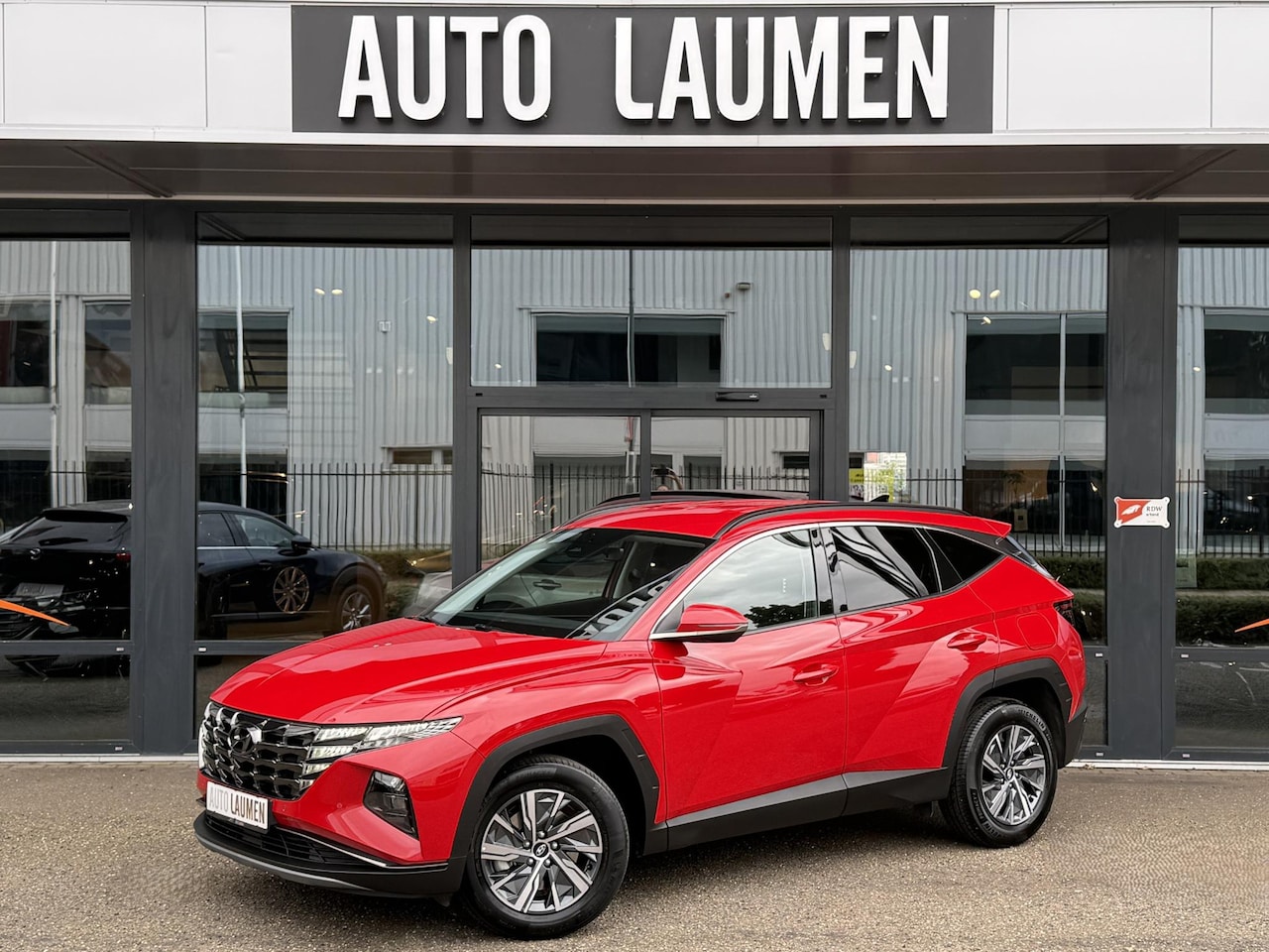 Hyundai Tucson - 1.6 T-GDI HEV i-Motion Hybrid 230 PK Automaat Navi Camera Keyless LED PDC V+A Virtual Carp - AutoWereld.nl