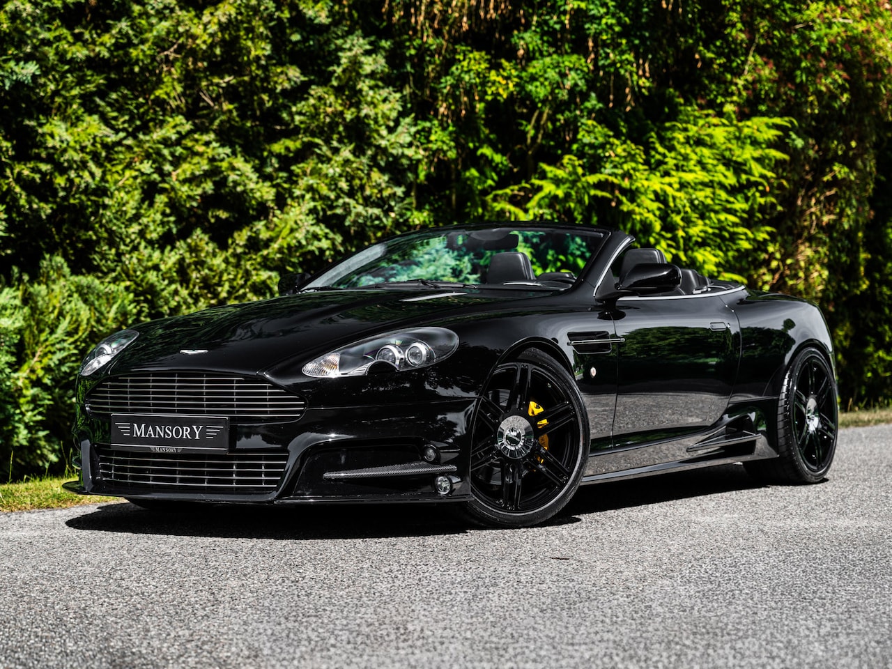 Aston Martin DB9 Volante - 5.9 V12| Mansory - AutoWereld.nl