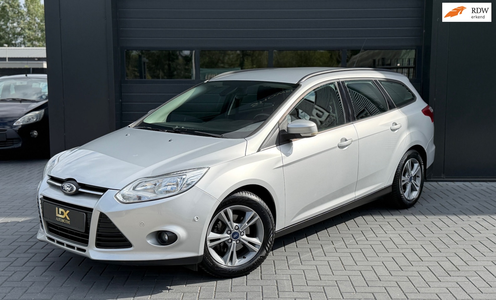 Ford Focus Wagon - 1.0 EcoBoost Titanium|Rem vv|Camera|Sensoren - AutoWereld.nl