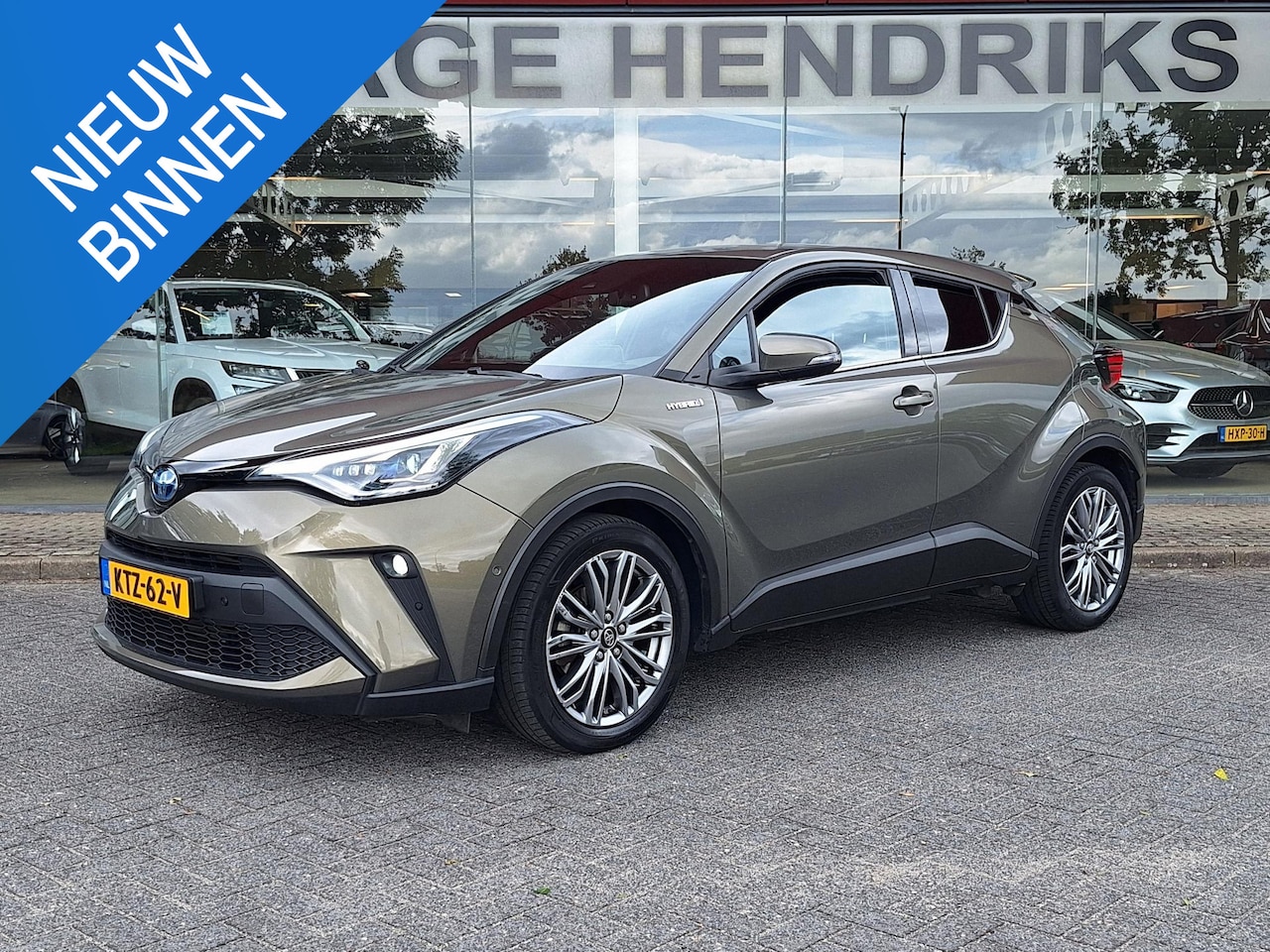 Toyota C-HR - 2.0 Hybrid Executive | Leder Stof | Adaptive CC | LED | Camera | Climate | Facelift | - AutoWereld.nl