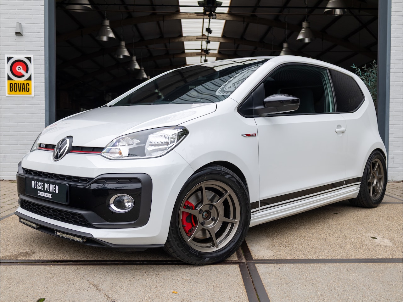 Volkswagen Up! - 1.0 TSI GTI *Beats | Cruise | Clima | Stoelverwarming | Camera | Sensoren | 15" | LED* - AutoWereld.nl