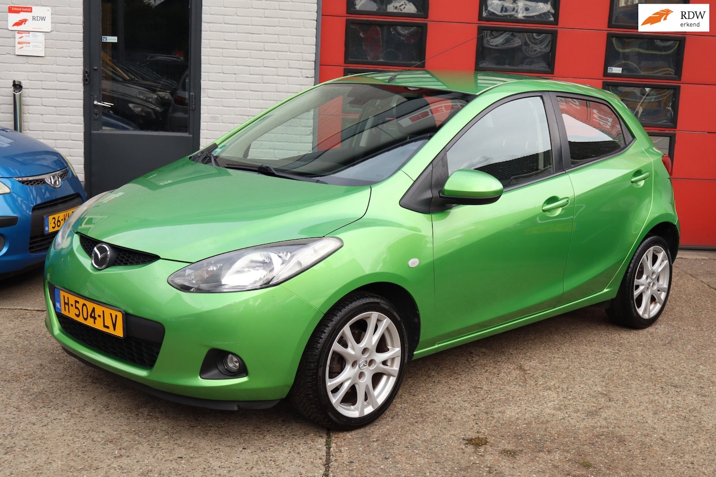 Mazda 2 - 1.3hp S-VT Touring .5 DEURS. AIRCO. - AutoWereld.nl