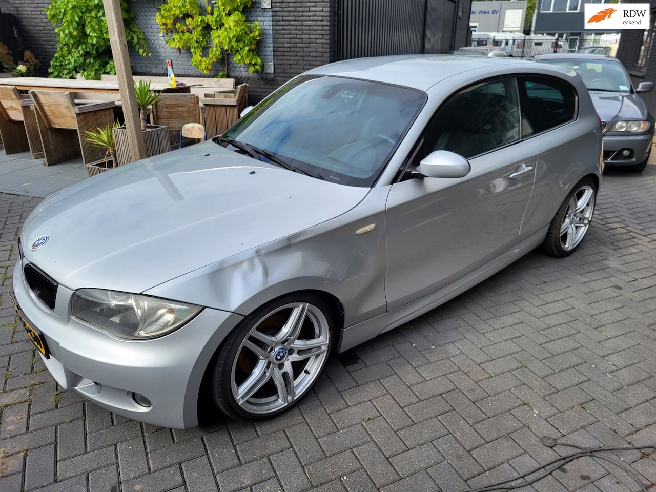 BMW 1-serie - 116i 3drs koelprobleem - AutoWereld.nl