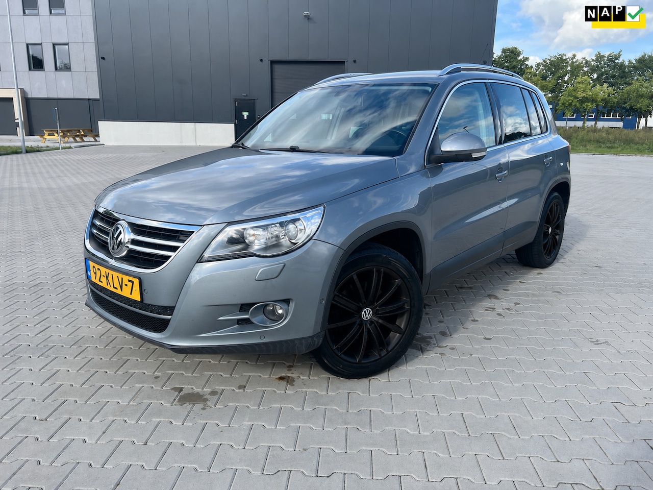 Volkswagen Tiguan - 1.4 TSI Sport&Style 4Motion Stoelverwarming - AutoWereld.nl