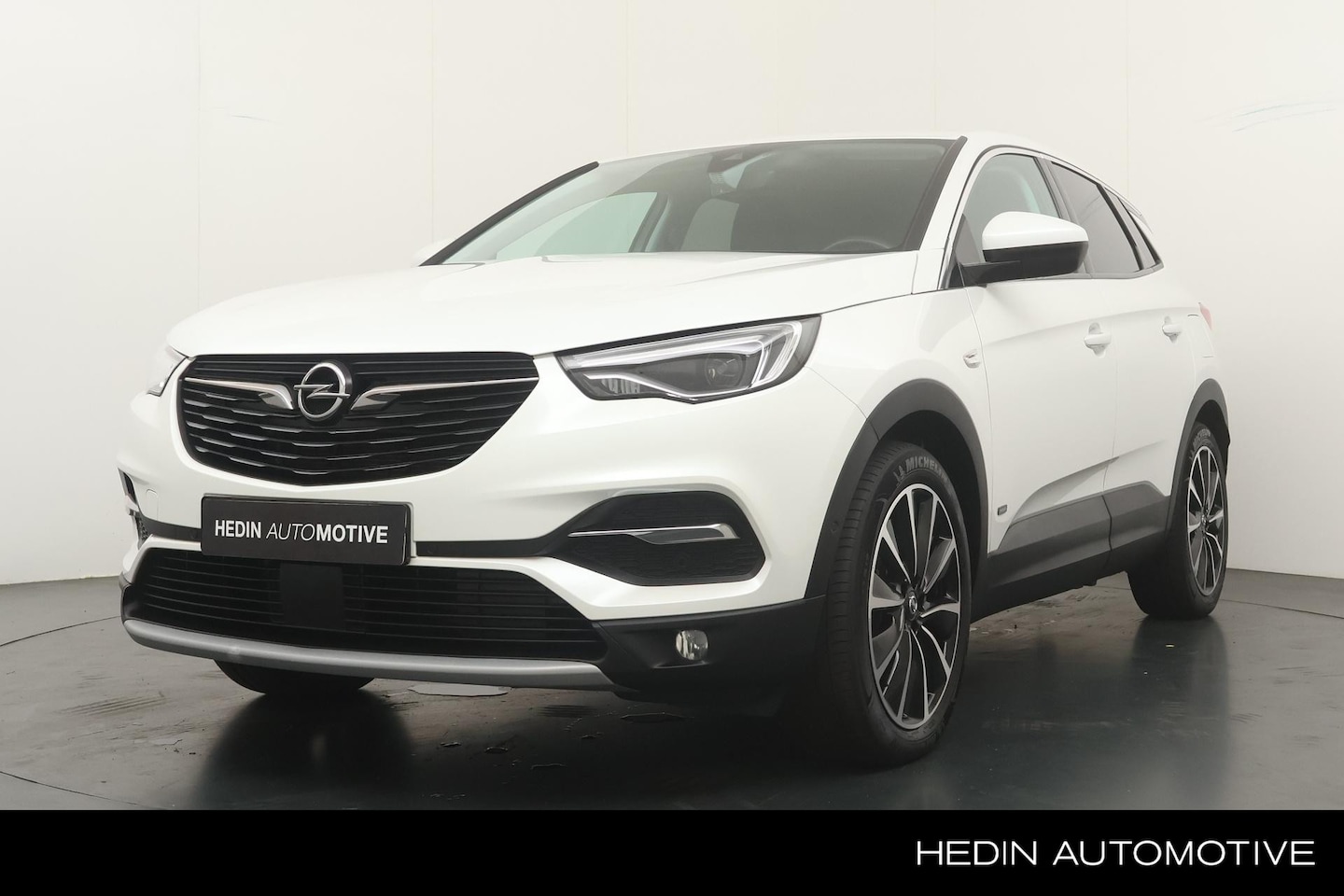 Opel Grandland X - 1.6 225pk Turbo Hybrid Business Executive | Trekhaak | Parkeer Camera | Elektrische Koffer - AutoWereld.nl