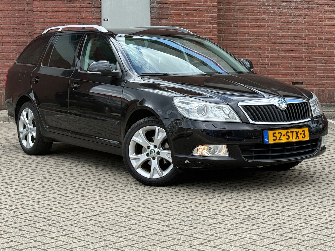 Skoda Octavia Combi - 1.2 TSI Elegance|AUTOMAAT|INVALIDE AUTO|HANDREM+GAS|GOED ONDERHOUDEN - AutoWereld.nl