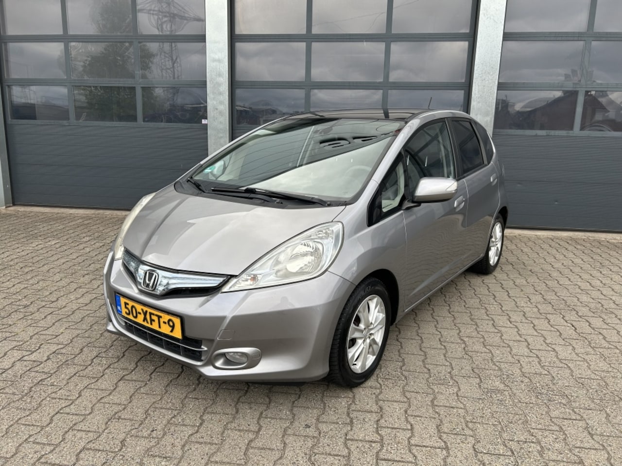 Honda Jazz - Hybrid 1.4 i-VTEC 102pk CVT Elegance - AutoWereld.nl