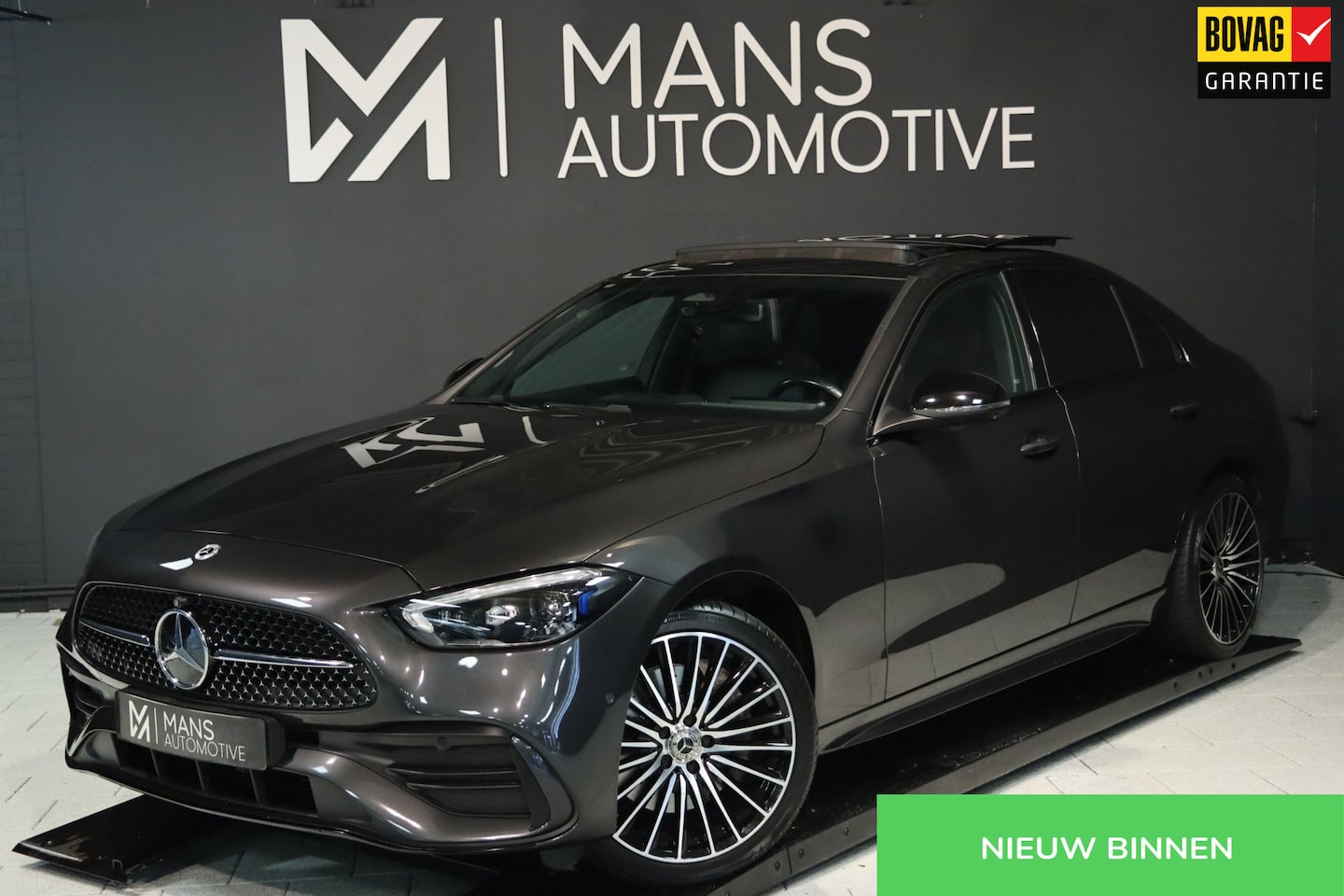 Mercedes-Benz C-klasse - 300 e AMG Line / PANO / HUD / 2X MEMORY / 360 / ACC / KEYLESS - AutoWereld.nl
