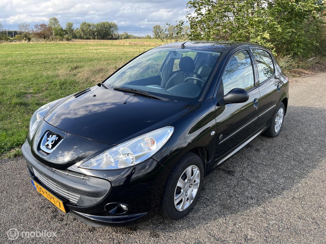 Peugeot 206 - 1.4 Urban Move / 5 Drs / Airco / LEES TEKST - AutoWereld.nl
