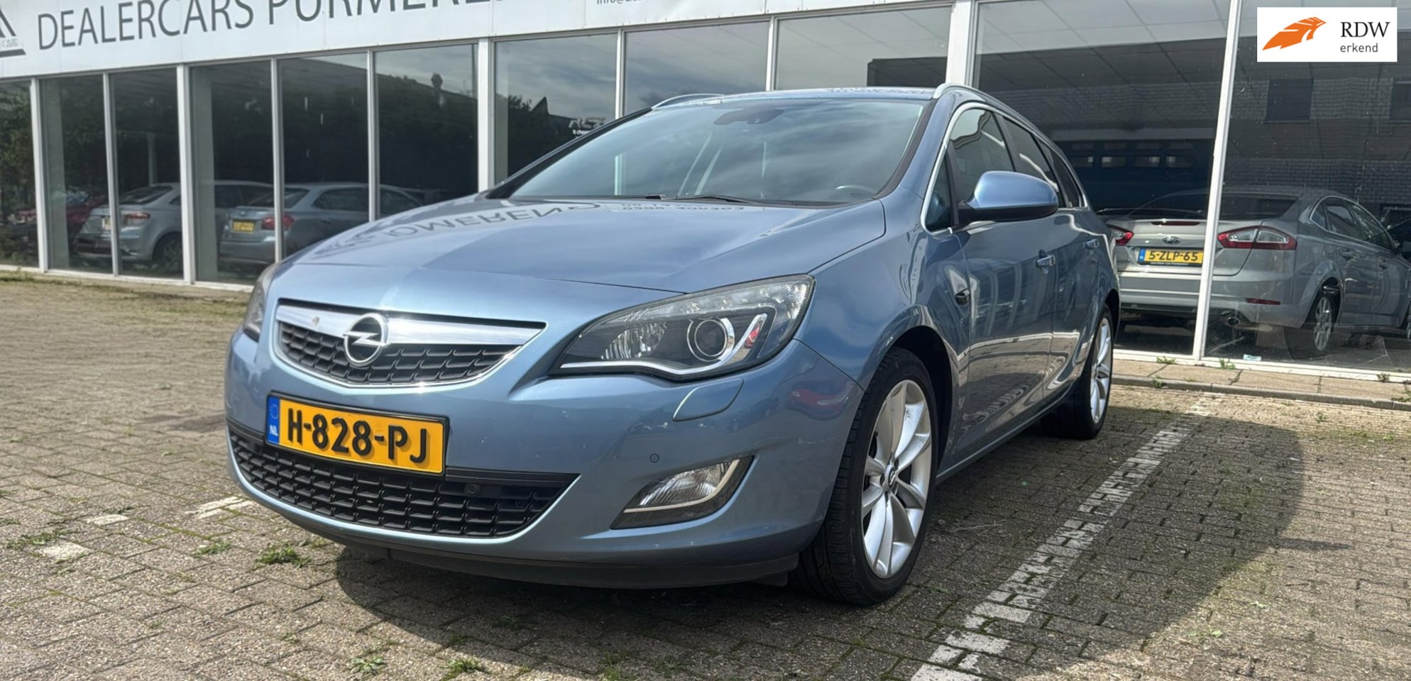 Opel Astra Sports Tourer - 1.4 Turbo Sport 1.4 Turbo Sport - AutoWereld.nl