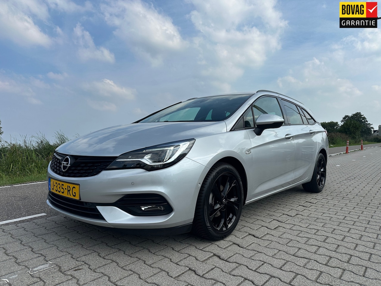 Opel Astra Sports Tourer - 1.2 Ultimate 1.2 Ultimate, Trekhaak, Camera, Stoelverwarming, Carplay, Cruisecontrol, Lane Assist - AutoWereld.nl