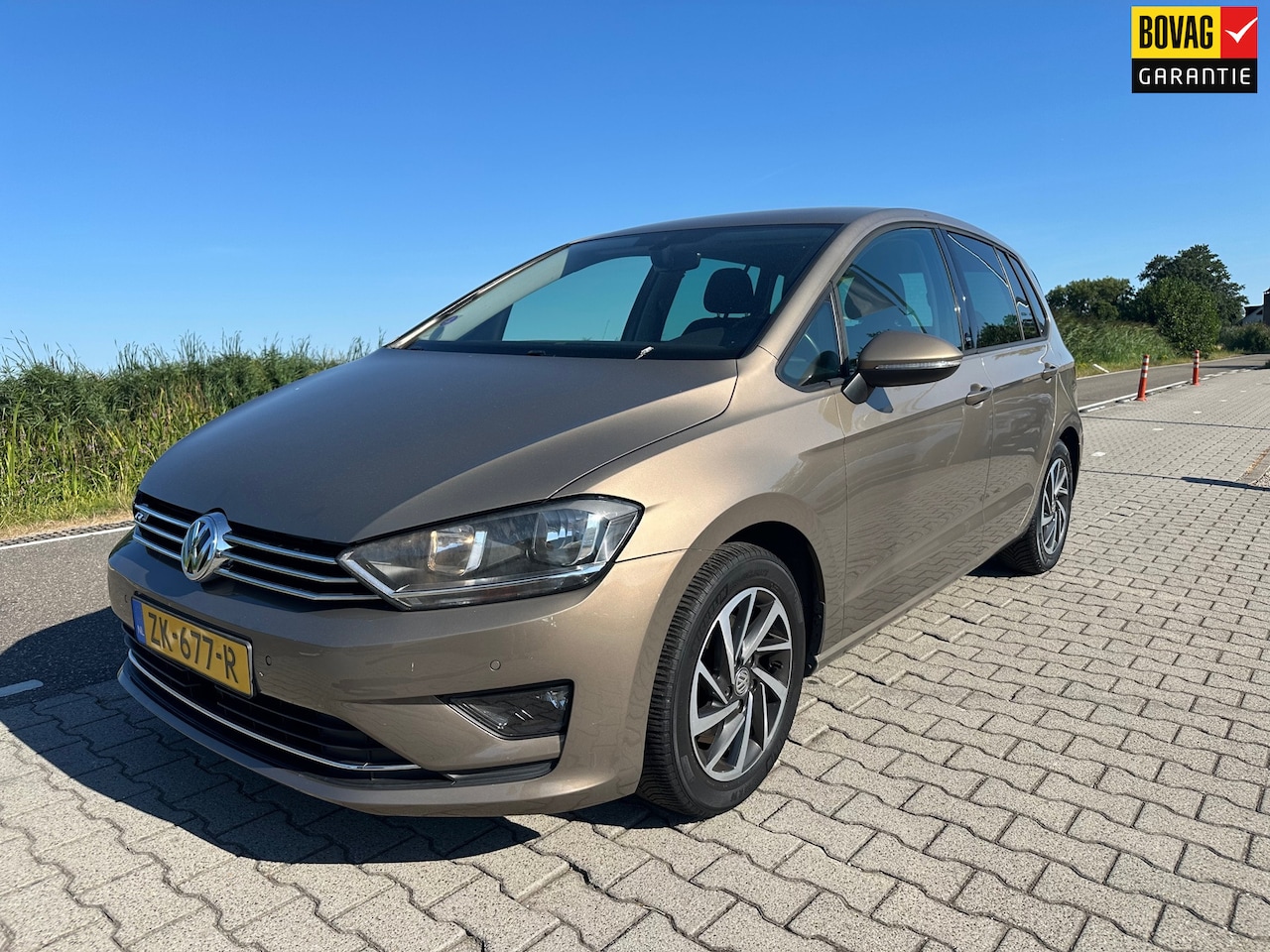 Volkswagen Golf Sportsvan - 1.4 TSI Highline 1.4 TSI Highline, Carplay, Stoelverwarming, Cruisecontrol adaptief, PDC - AutoWereld.nl
