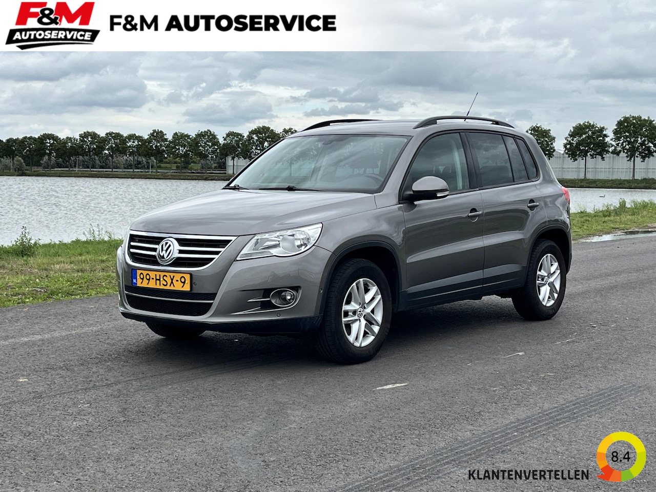 Volkswagen Tiguan - 2.0 TSI Comfort&Design 4Motion Clima, cruise, pdc, trekhaak - AutoWereld.nl