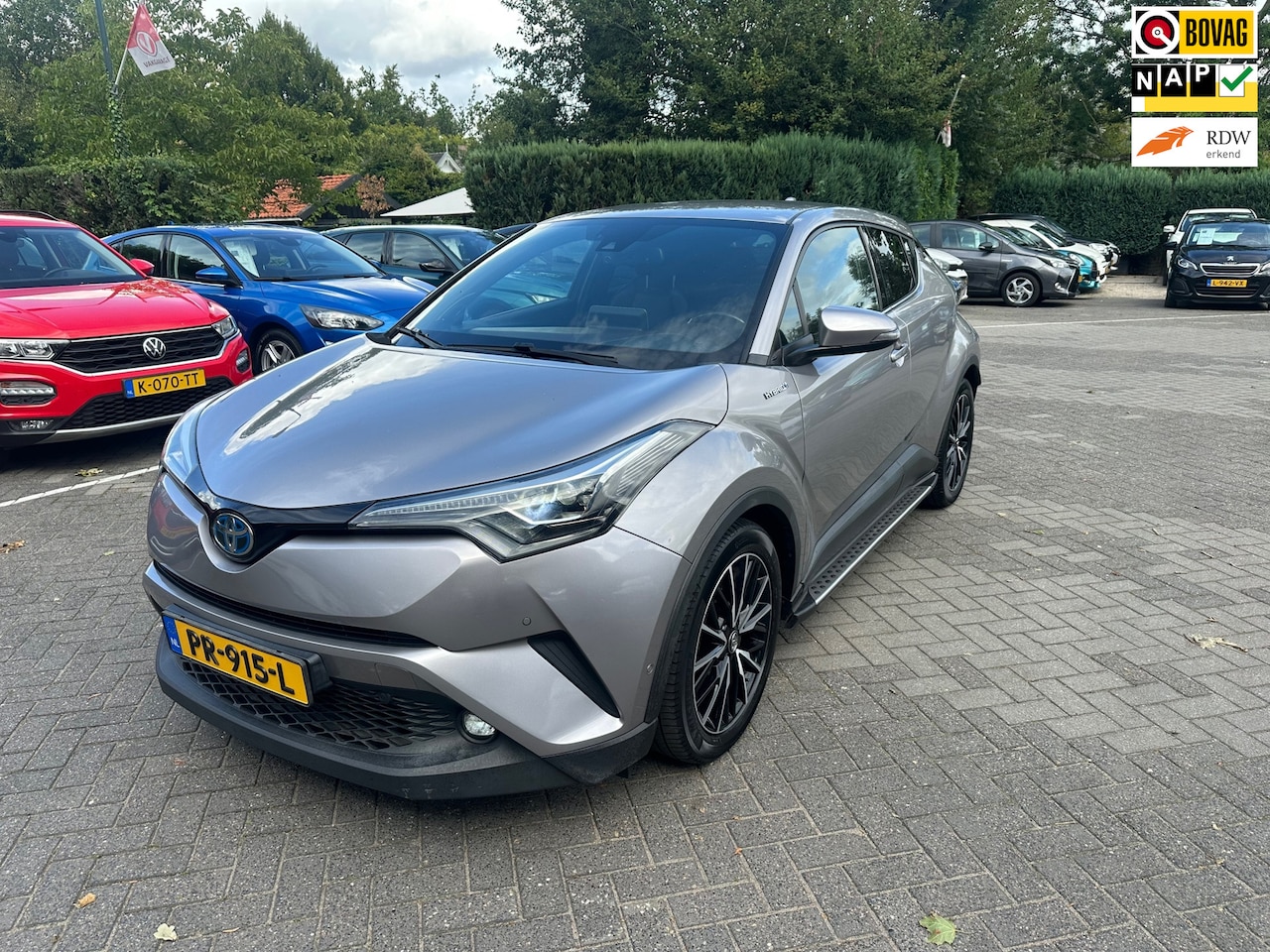 Toyota C-HR - 1.8 Hybrid Premium 1.8 Hybrid Premium , navigatie , camera , pdc , alle optie s - AutoWereld.nl