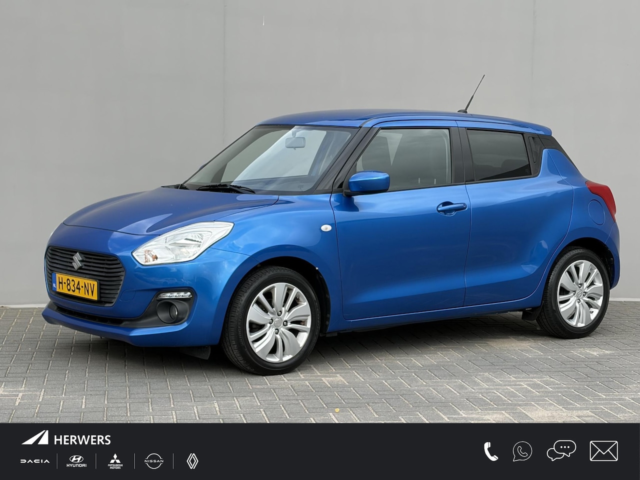 Suzuki Swift - 1.2 Select / Stoelverwarming / Airco / Achteruitrijcamera / Navigatie - AutoWereld.nl