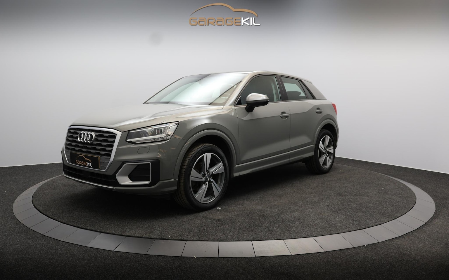 Audi Q2 - 1.0 TFSI #limited Orig. NL / LED / Trekhaak afn. / 18'' LM velgen / Airco / Nano grijs / P - AutoWereld.nl