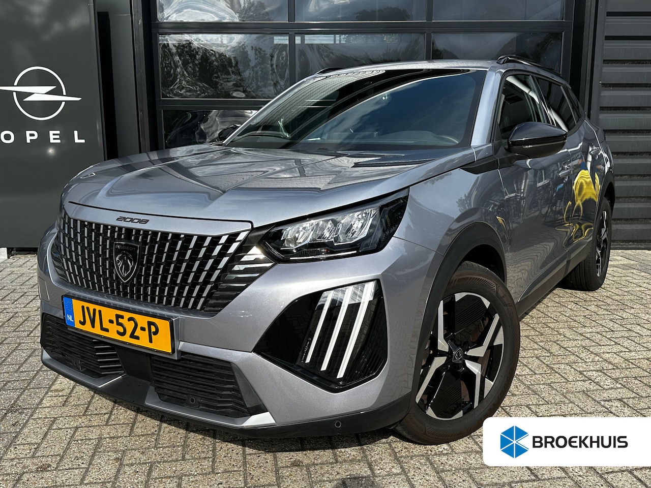 Peugeot 2008 - 1.2 PureTech 100PK Allure | KEYLESS ENTRY & START| DRAADLOZE TELEFOONLADER| LED| NAVIGATIE - AutoWereld.nl