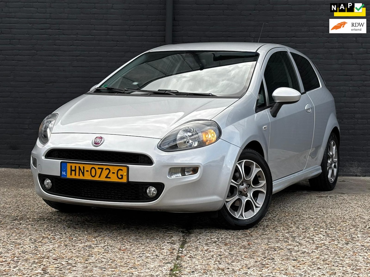 Fiat Punto Evo - 1.3 M-Jet Lounge TREKHAAK|AIRCO - AutoWereld.nl