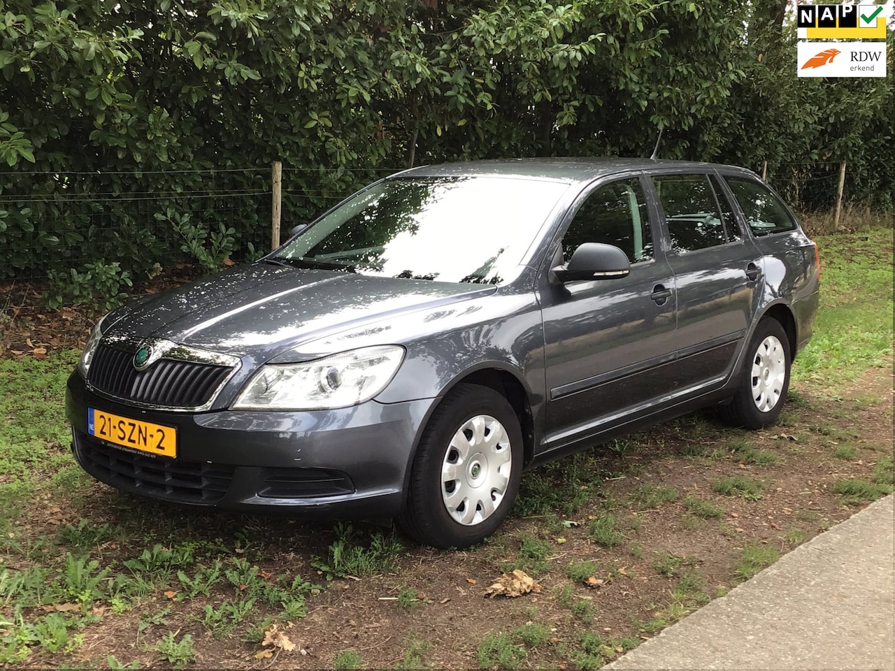 Skoda Octavia Combi - 1.4 Comfort met trekhaak, airco en NAP - AutoWereld.nl