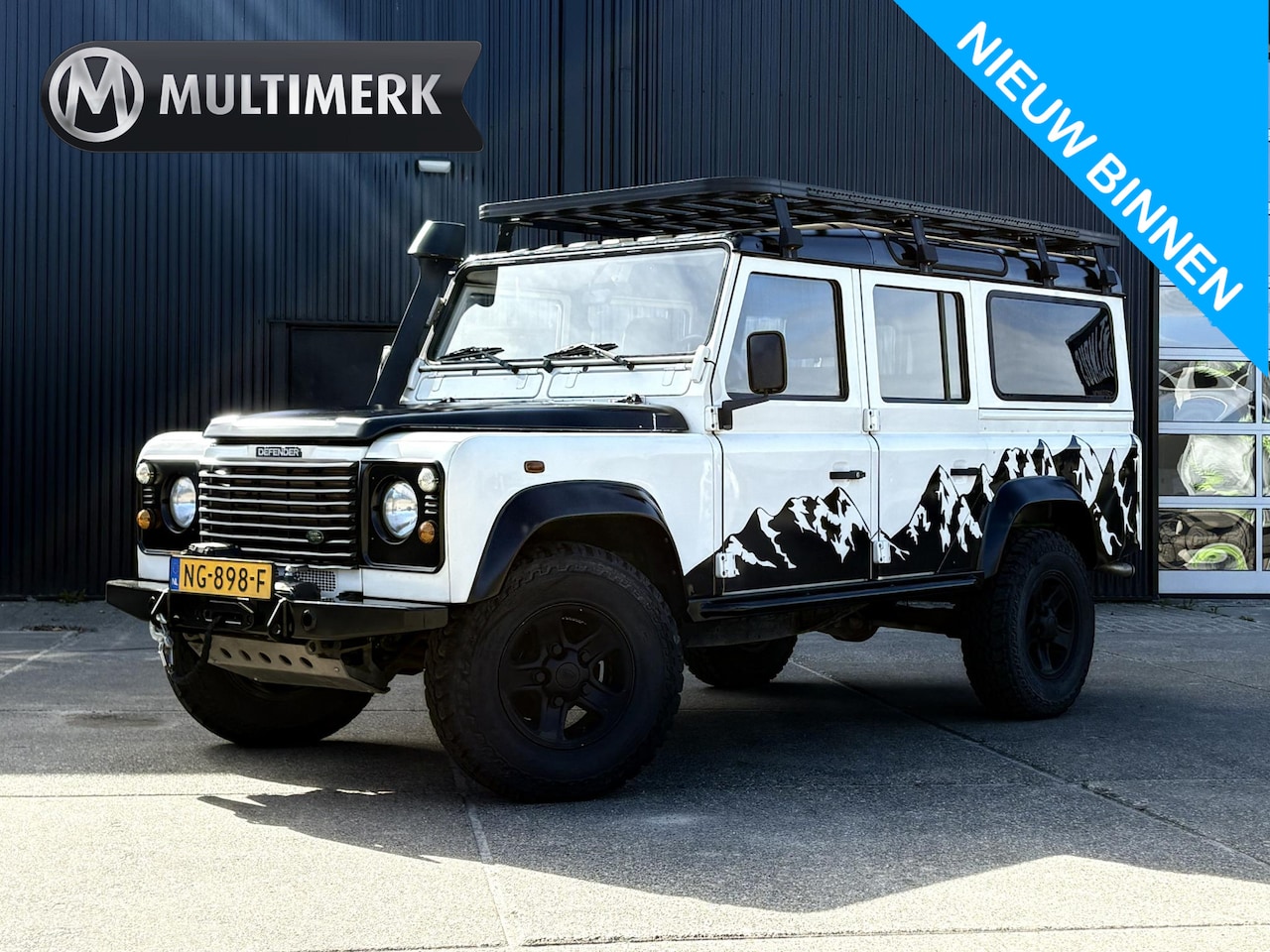 Land Rover Defender 110 - 2.5 TD5 SAFARI | GRIJS KENTEKEN 2P | LIER | LUXE STOEL | SNORKEL | DAKTENT FEMKES | RVS UI - AutoWereld.nl