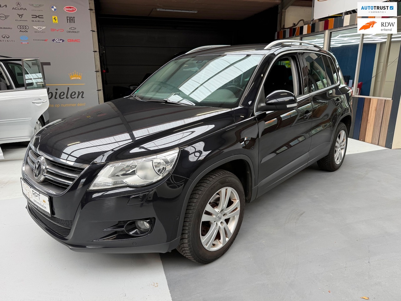 Volkswagen Tiguan - 2.0 TSI Sport&Style 4Motion DSG Automaat - AutoWereld.nl