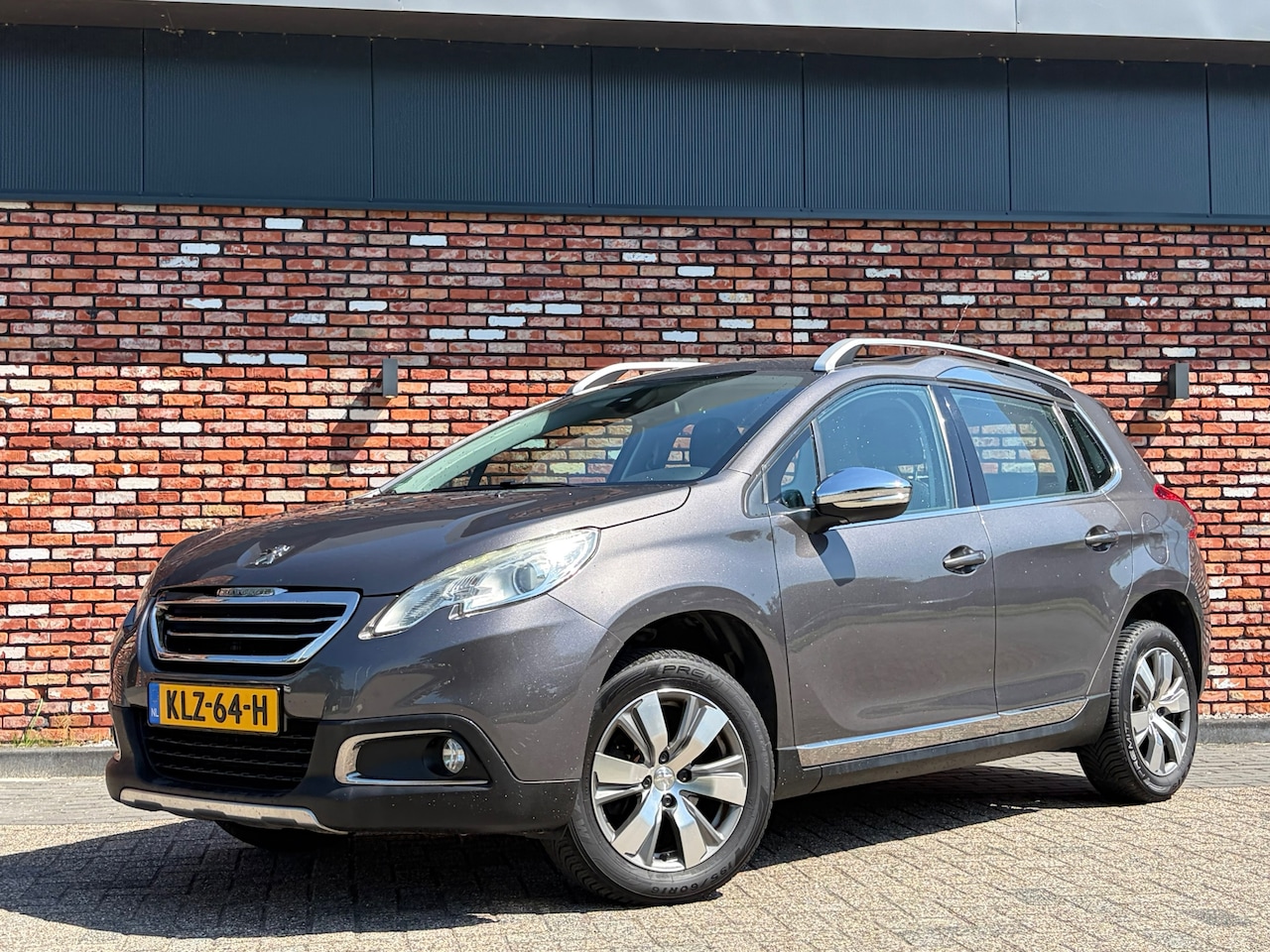 Peugeot 2008 - 1.2 PureTech Allure Nav/Cruise Pdc Clima Hoogzitter Voll.Onderhouden! - AutoWereld.nl