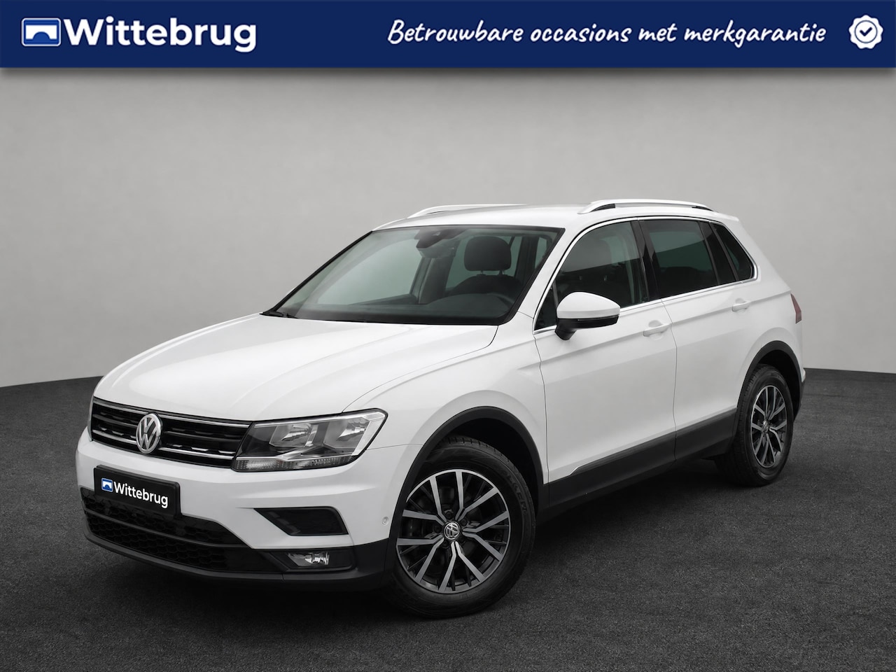 Volkswagen Tiguan - 1.5 TSI 130pk Comfortline Business / Navigatie / LM velgen 17 inch / Camera / Park Assist - AutoWereld.nl
