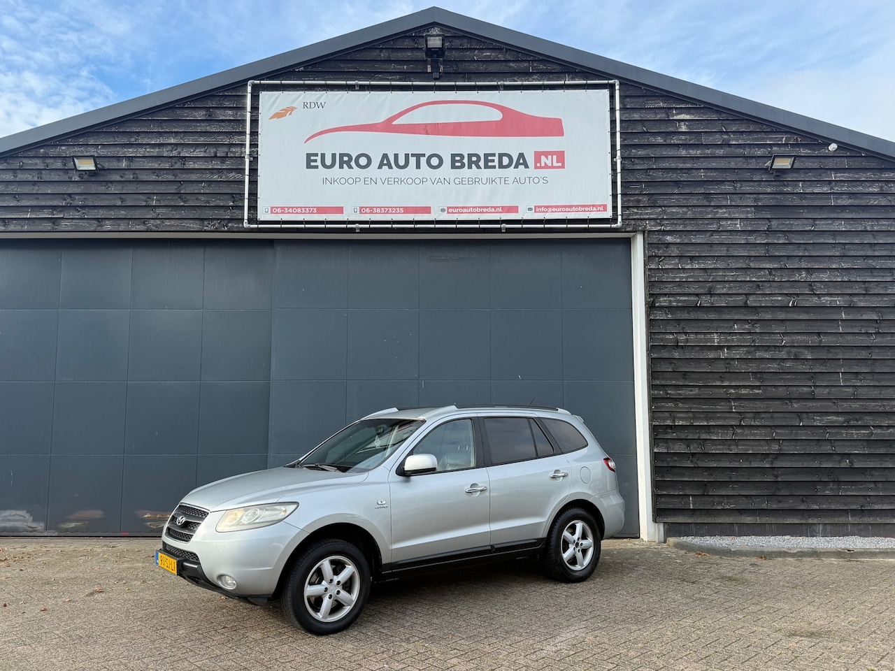 Hyundai Santa Fe - 2.7i V6 4WD Style 7p. 2.7i V6 4WD Style 7p. - AutoWereld.nl