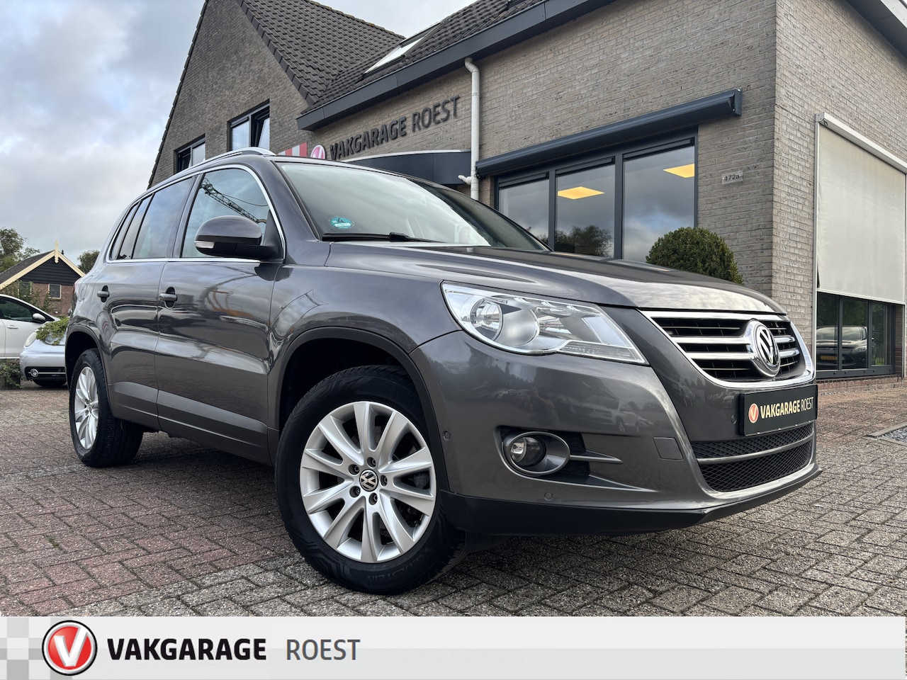 Volkswagen Tiguan - 1.4 TSI Sport & Style Trekhaak / All-Seasons / Parkeersensors - AutoWereld.nl