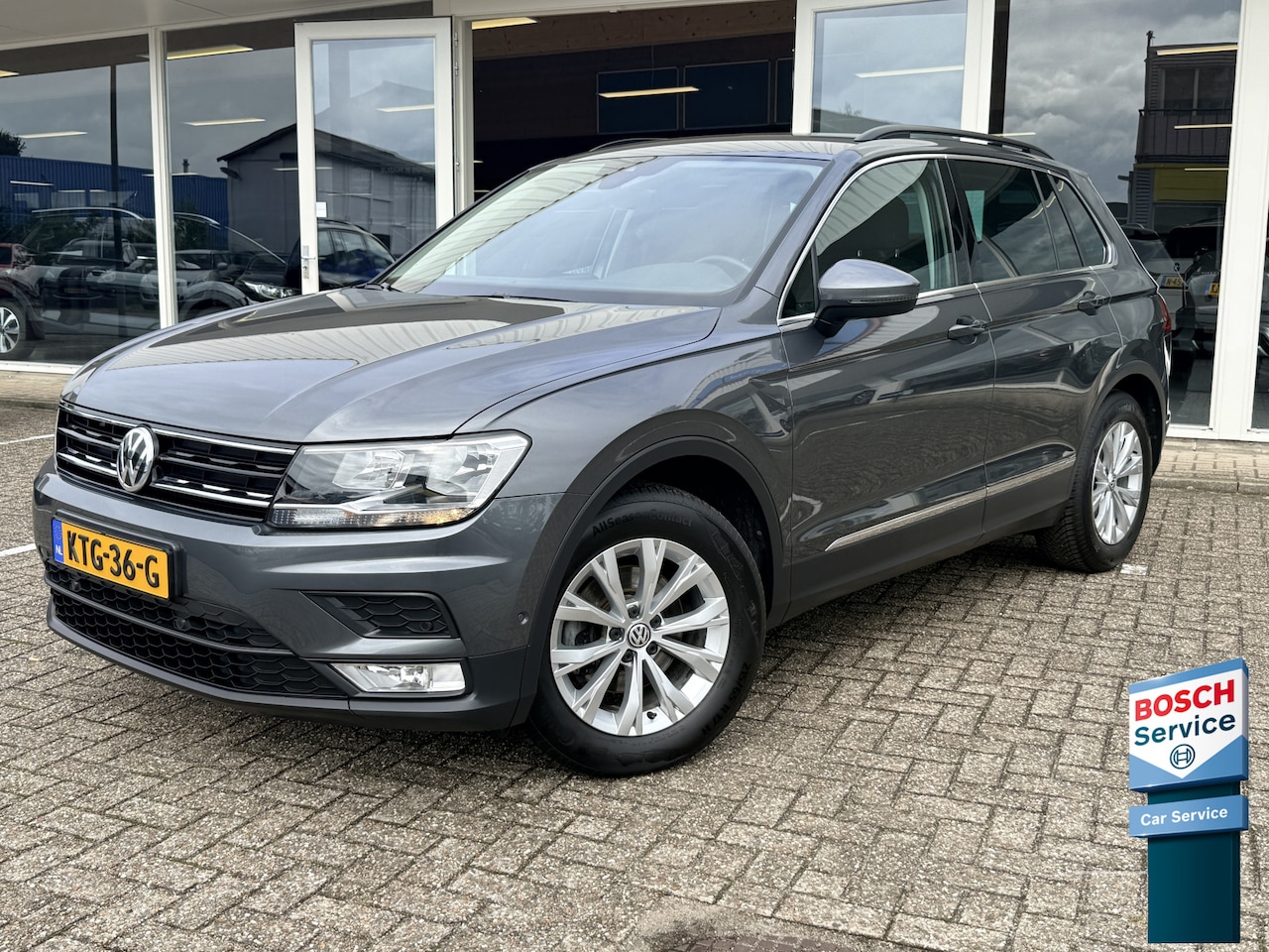 Volkswagen Tiguan - 1.4 TSI ACT Highline | Adapt. Cruise | Apple/Android | Stoel- en stuurverwarming | Sportst - AutoWereld.nl