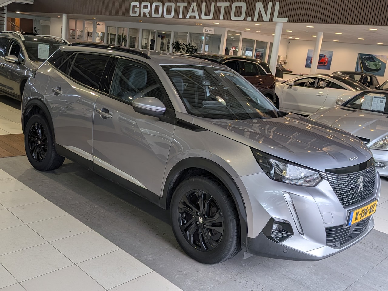 Peugeot 2008 - 1.2 PureTech Blue Lease Allure Airco, Cruise Control, Stuurbekrachtiging - AutoWereld.nl