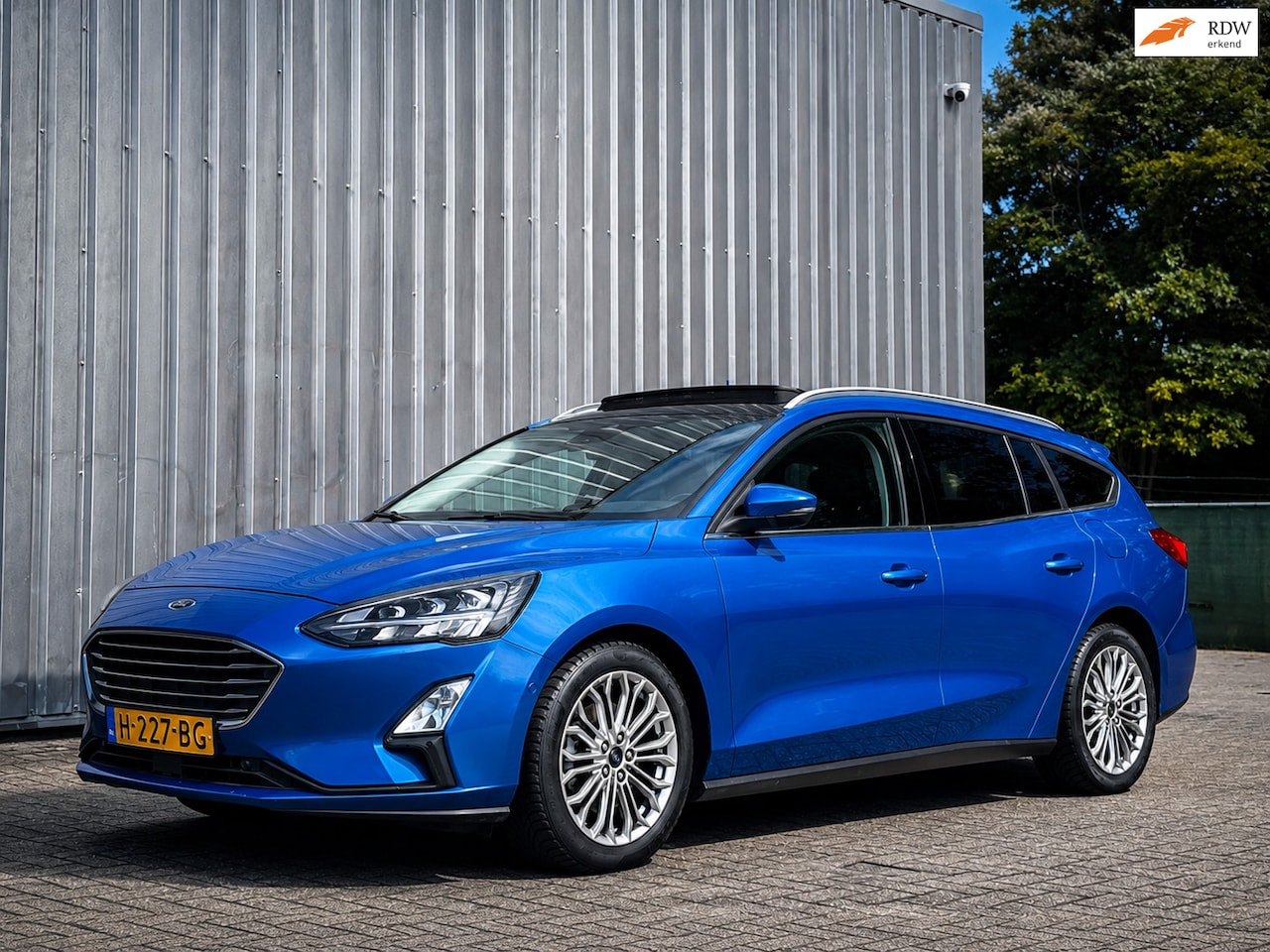 Ford Focus Wagon - 1.0 EcoBoost Titanium / PANO / LED / CARPLAY / - AutoWereld.nl