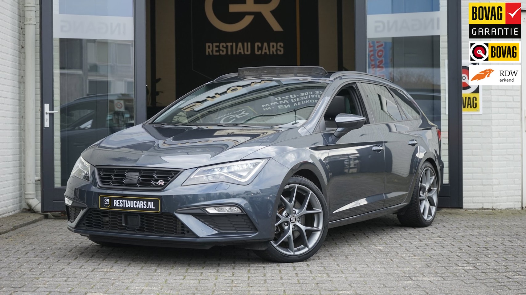 SEAT Leon ST - 2.0 TSI FR Ultimate Black Edition AUTOMAAT|ACC|AMBIANCE|BEATS|CAMERA|KEYLESS|MODE|PANORAMA - AutoWereld.nl