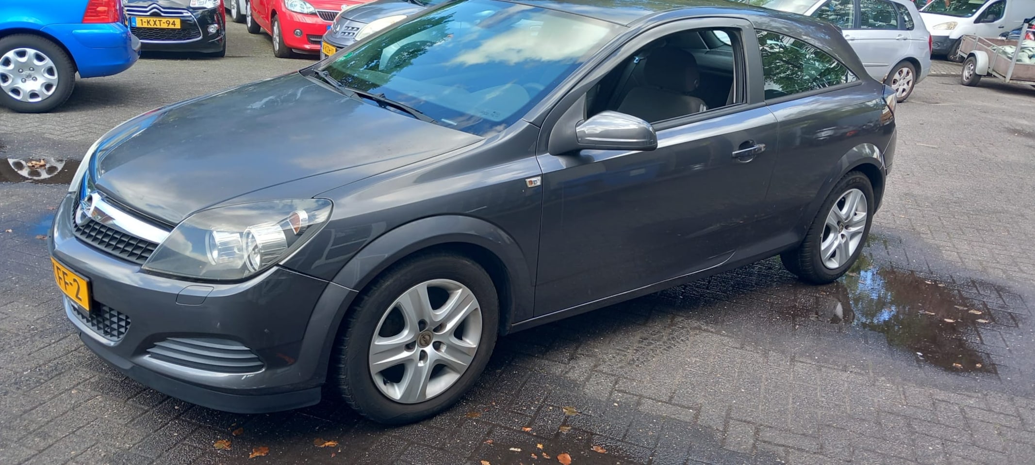 Opel Astra GTC - 1.8 Cosmo - AutoWereld.nl