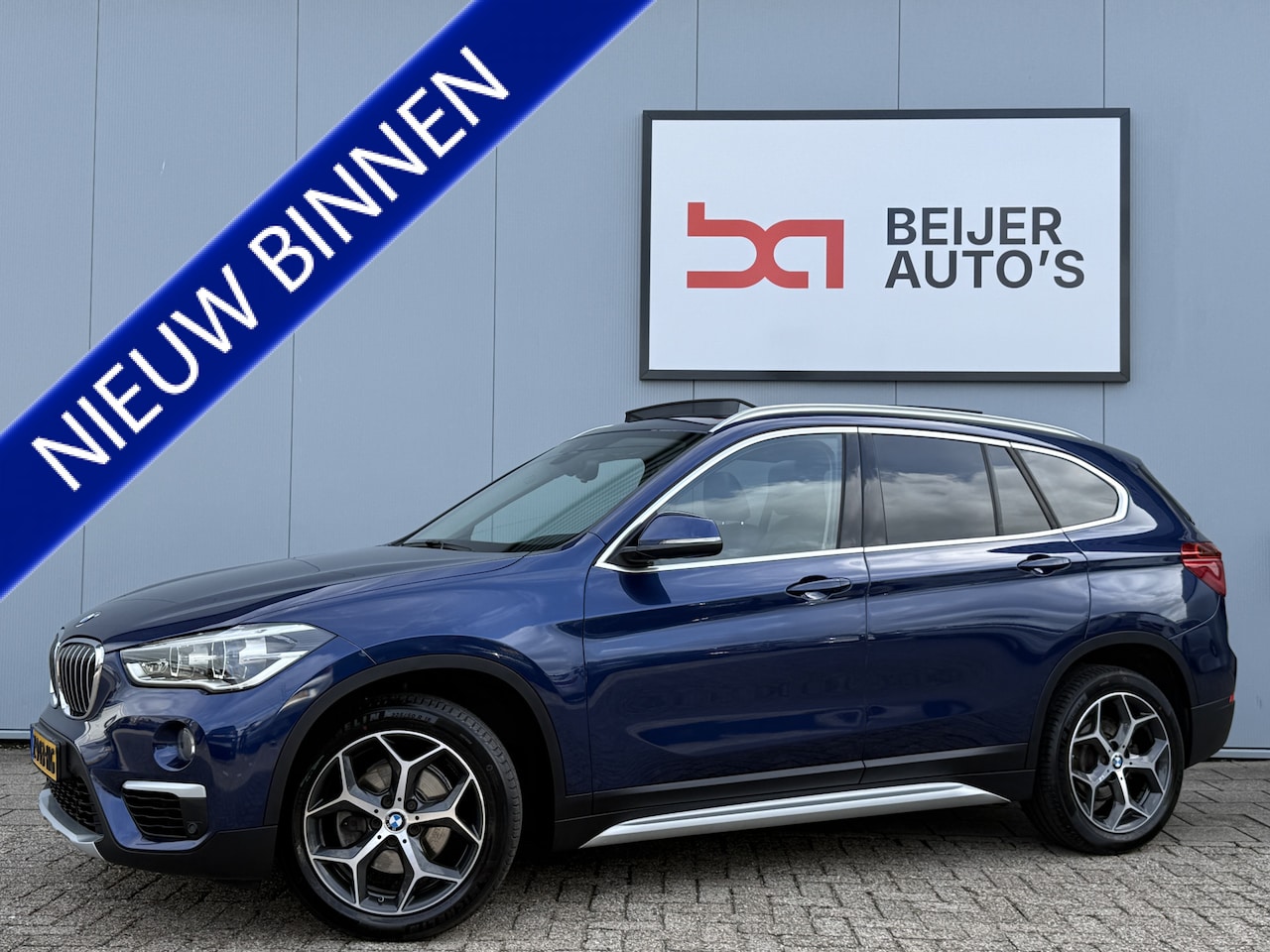 BMW X1 - sDrive18i High Executive Automaat Schuifdak/Trekhaak. - AutoWereld.nl
