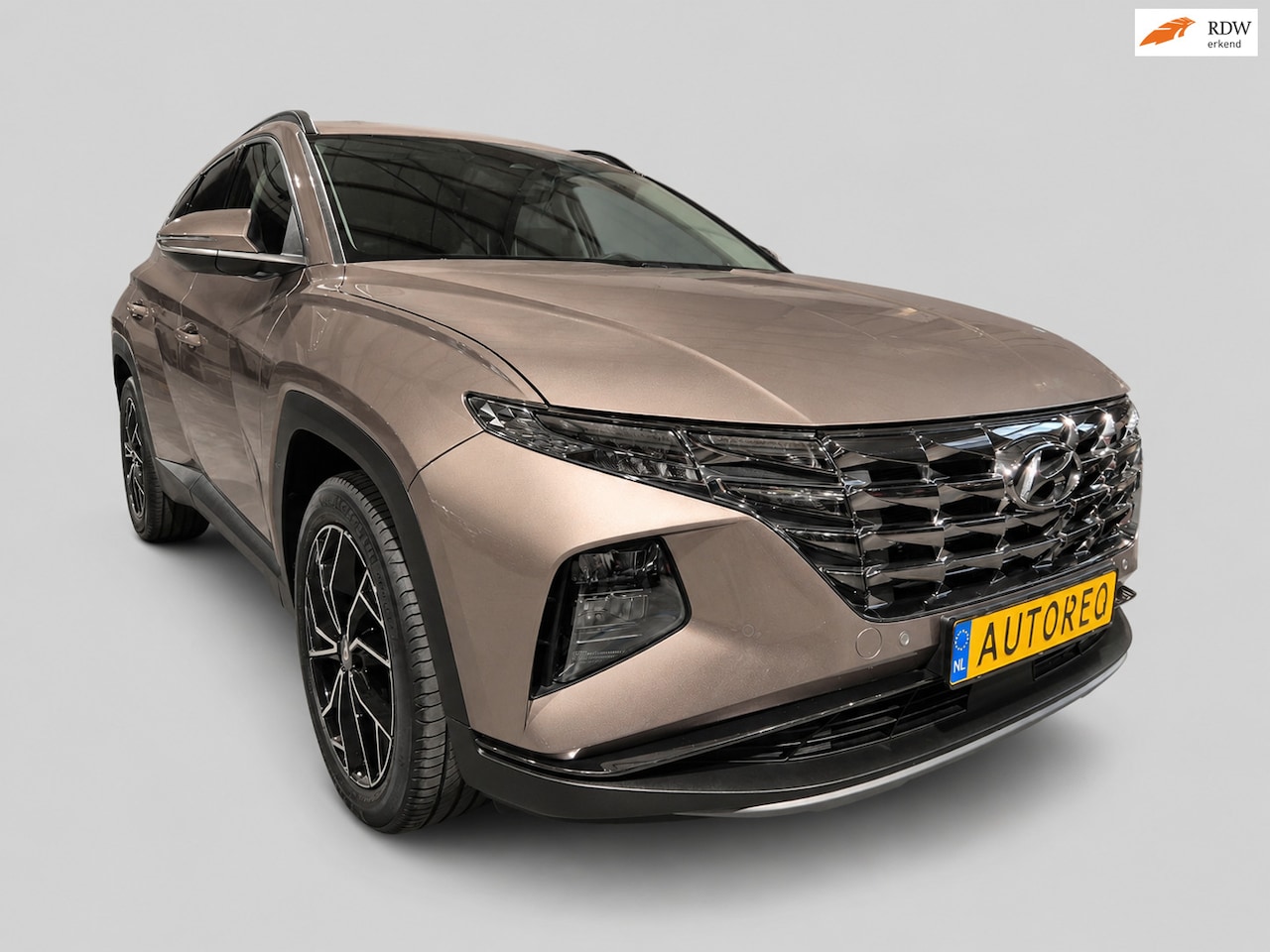 Hyundai Tucson - 1.6 T-GDI PHEV 4WD - Stoel en Stuurverw - Adapt Cruise - Lane Ass - Keyless - CarPlay - Ca - AutoWereld.nl