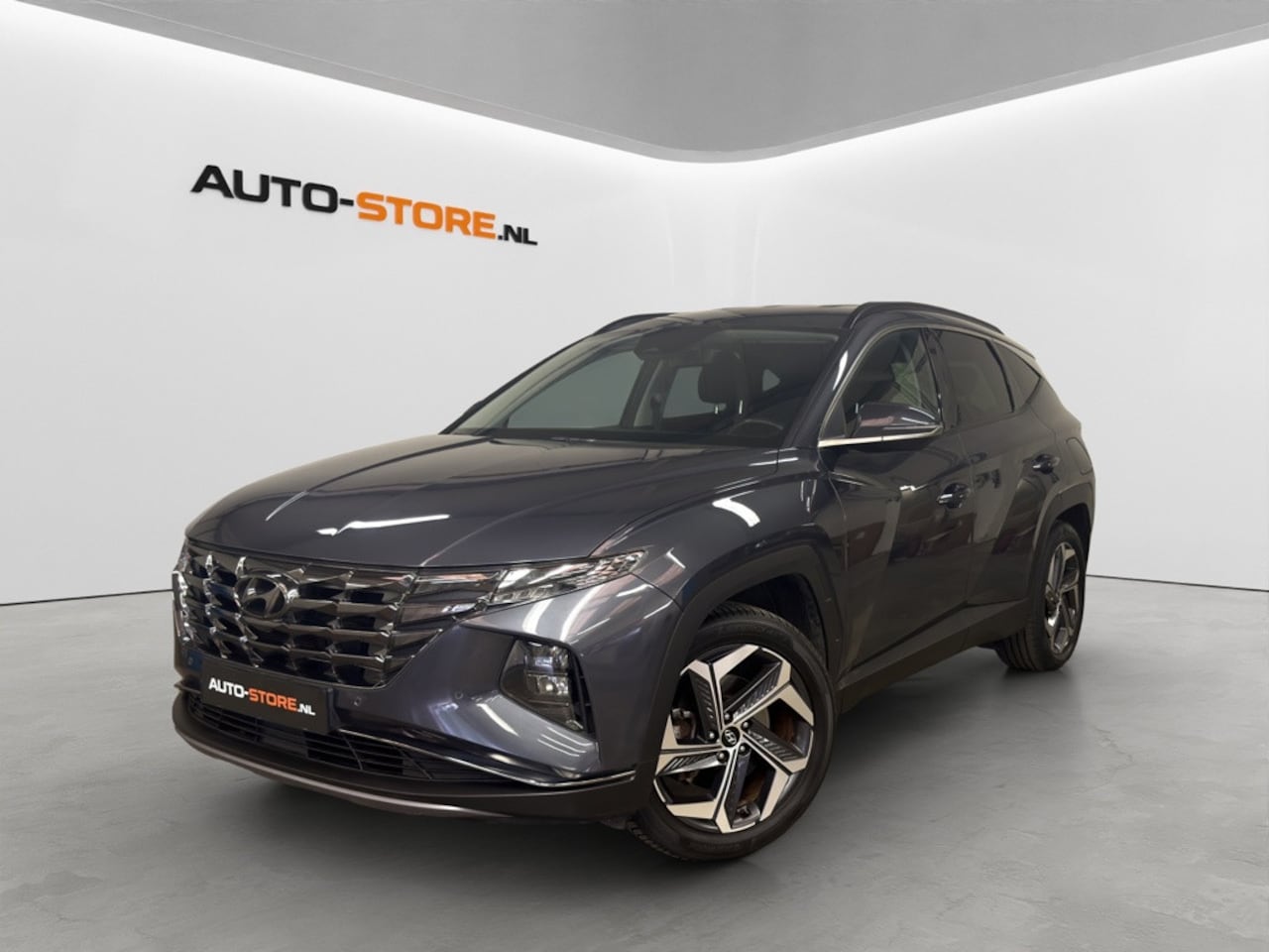 Hyundai Tucson - 1.6 T-GDI PHEV Comfort 4WD|SOH100%|NAVI|CAMERA|DEALER-OH. - AutoWereld.nl