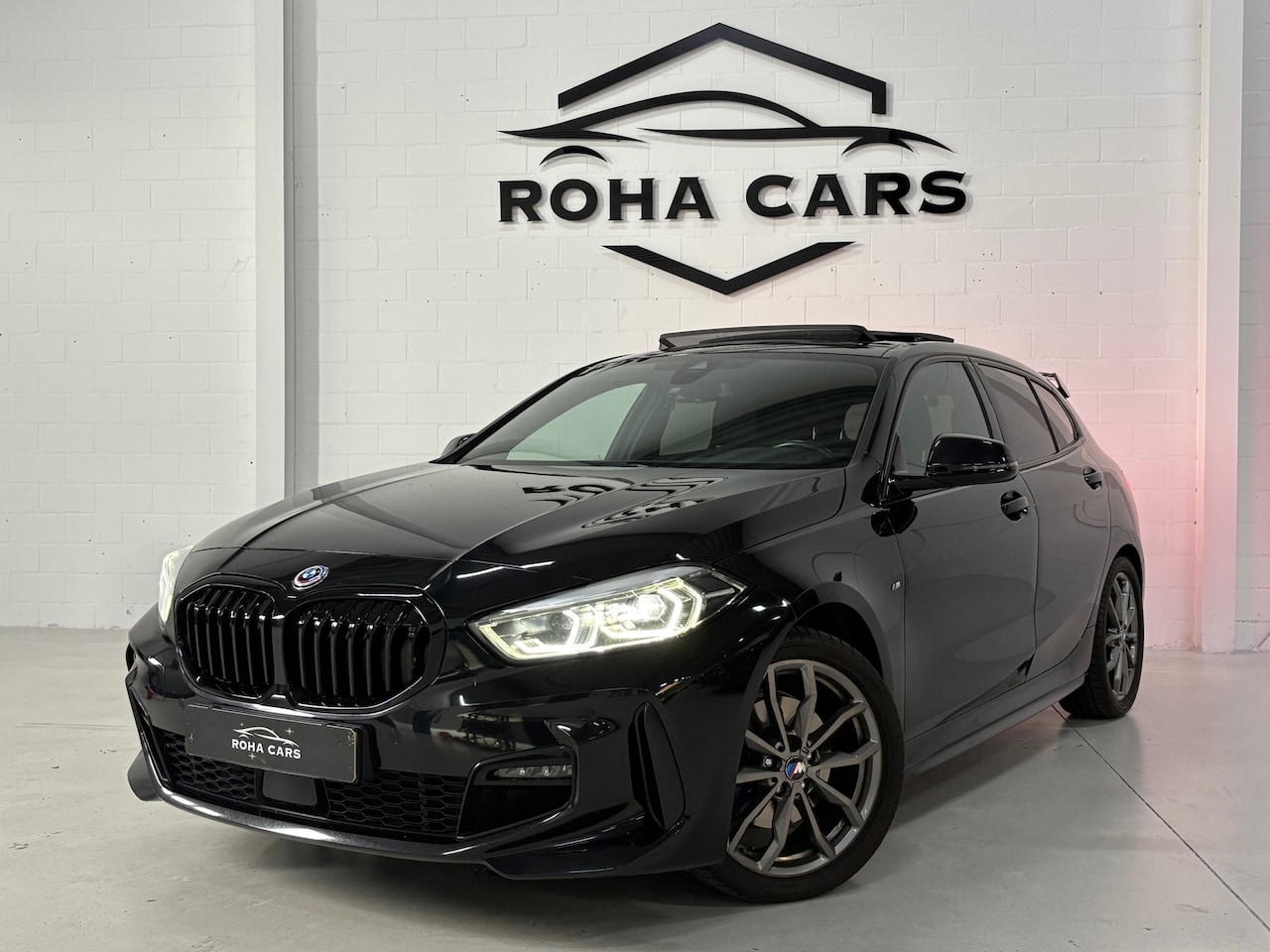 BMW 1-serie - 118i High Executive*Pano*Sfeer*AppleCarplay* - AutoWereld.nl