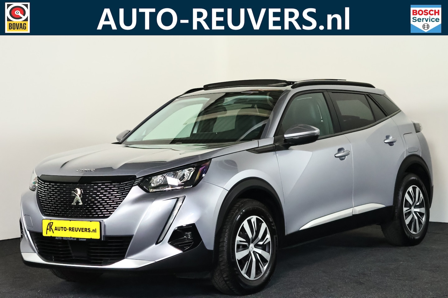 Peugeot 2008 - 1.2 PureTech Active / CarPlay / Panorama / Camera - AutoWereld.nl