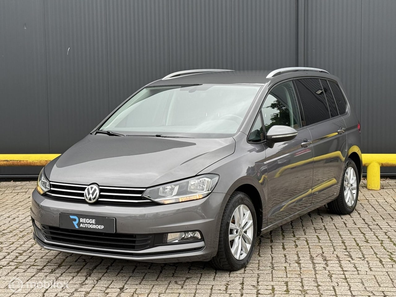 Volkswagen Touran - 1.4 TSI Comfortline AUTOMAAT | NAVI | PDC - AutoWereld.nl