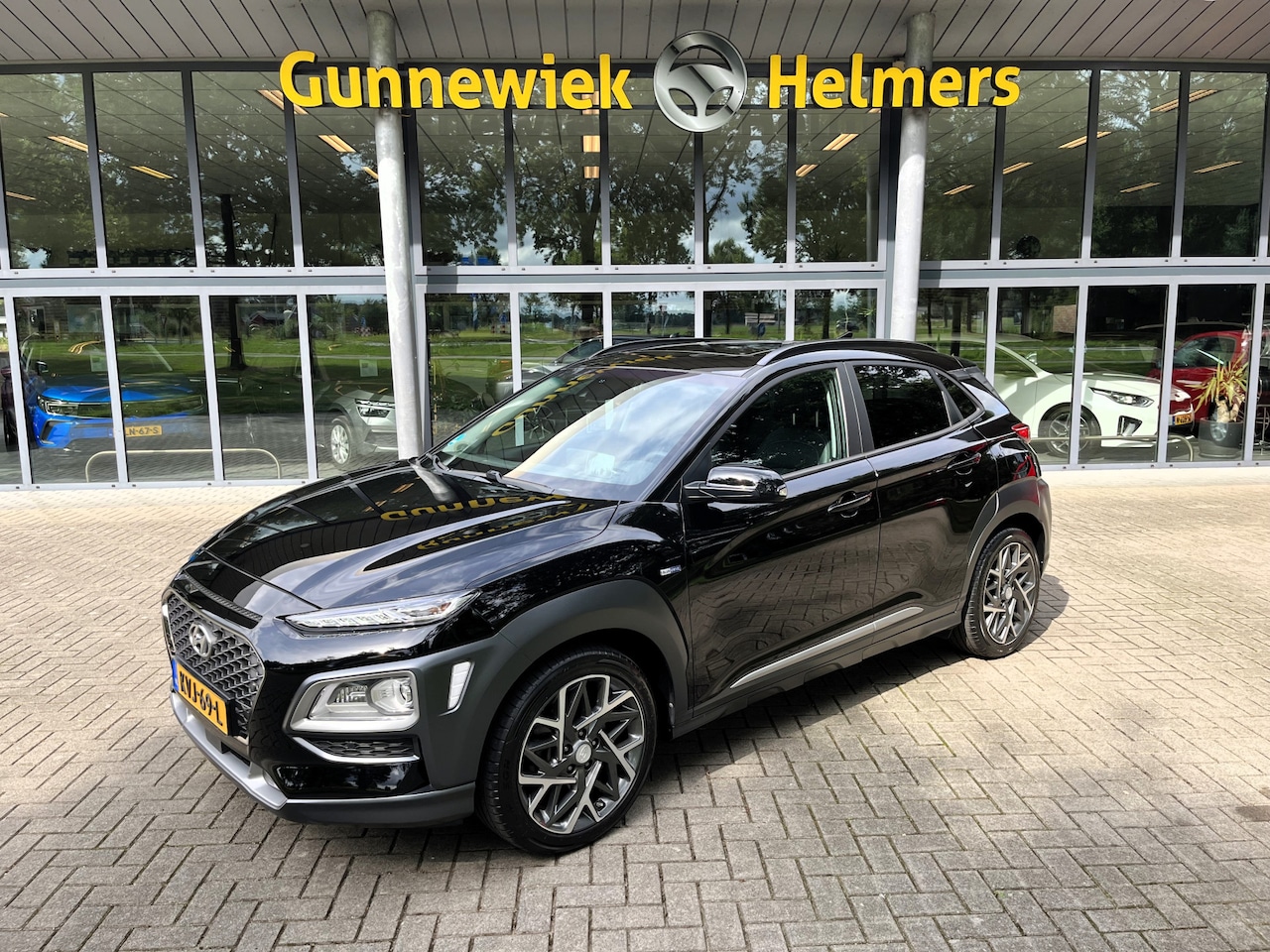 Hyundai Kona - 1.6 GDI HEV Premium | ACC | CAM | CARPLAY | CLIMA | LED | NAVI | SCHUIF/KANTELDAK | STUUR/ - AutoWereld.nl