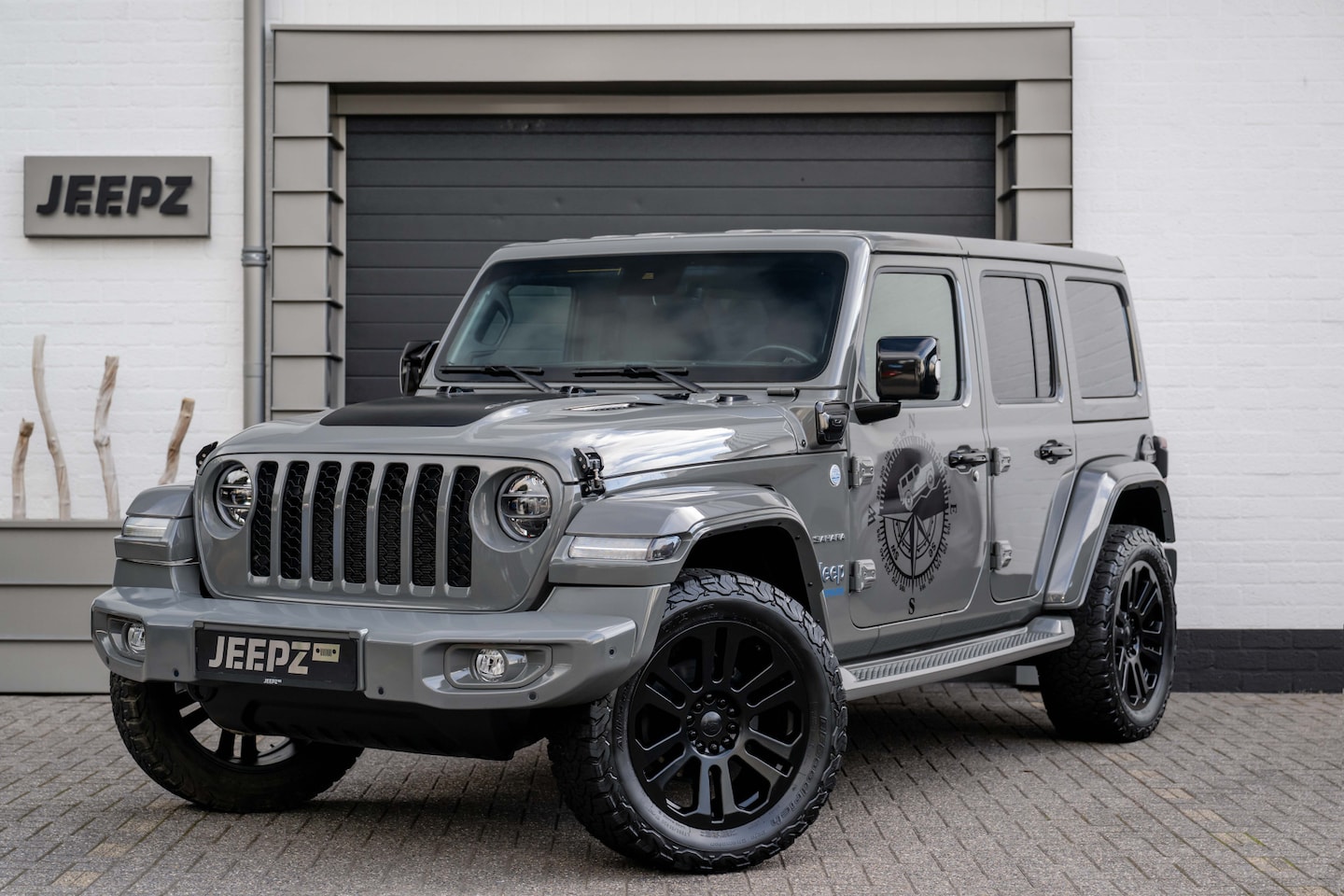 Jeep Wrangler Unlimited - 4xe 380 Sahara - 20" Lmv / Jeepz Edition - AutoWereld.nl