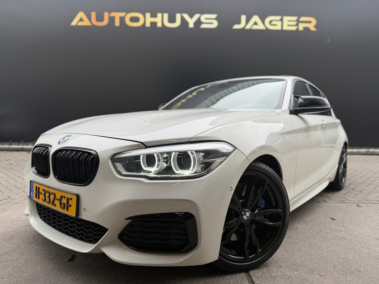 BMW 1-serie - MW 1-serie M140i High Executive Schuifdak h&K Leer Performance - AutoWereld.nl